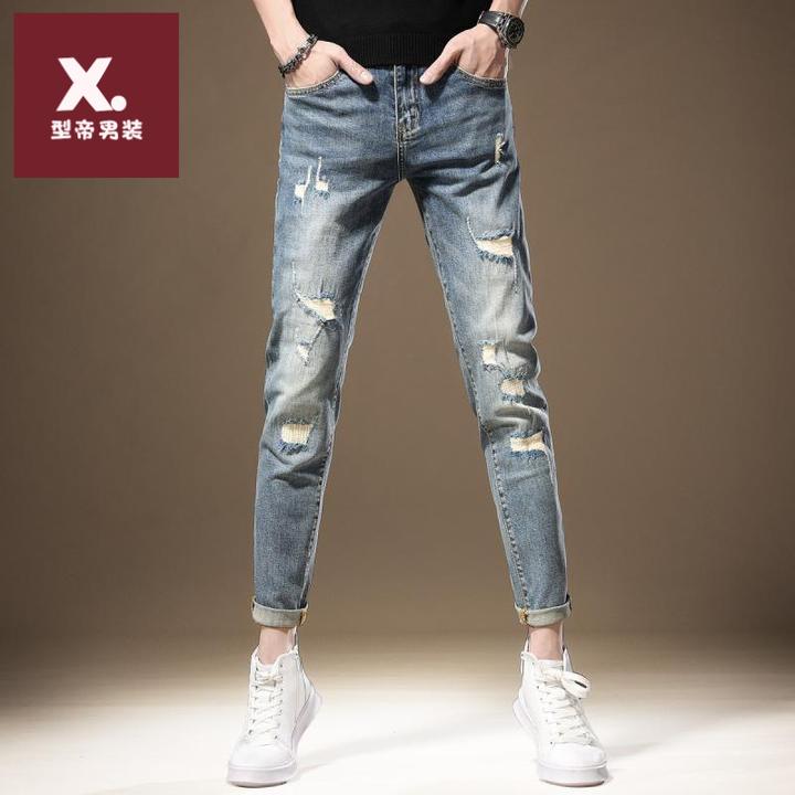 高端时尚破洞牛仔裤男修身小脚秋季新款浅蓝色休闲弹力韩版裤子男