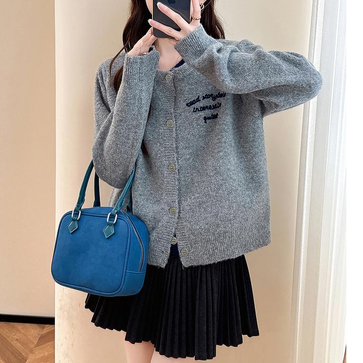 D1303   唐狮秋冬新款毛衣女简约字母假两件圆领针织开衫