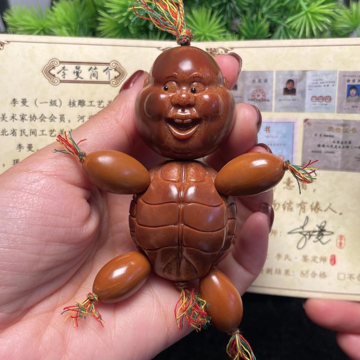 富贵人生小人儿龟仙小红人儿网红大橄榄核小人手把件文玩手把件