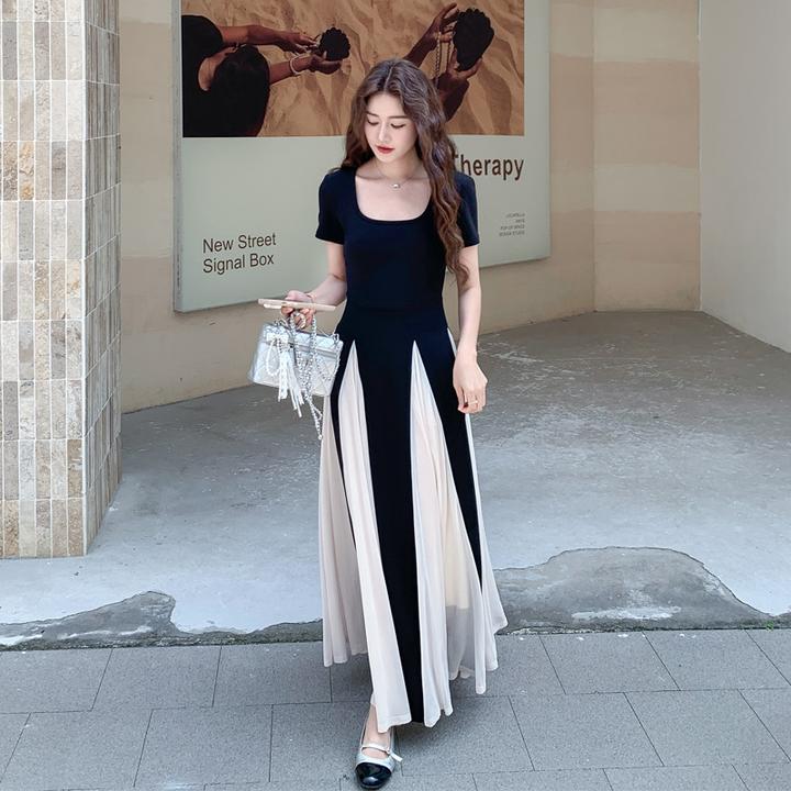 法式复古氛围感连衣裙女2025夏季新款不规则黑白撞色轻熟风A字裙