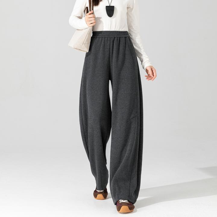 醋酸羊毛运动香蕉裤女2025新款冬季加厚郑州女裤高级感弧形镰刀裤