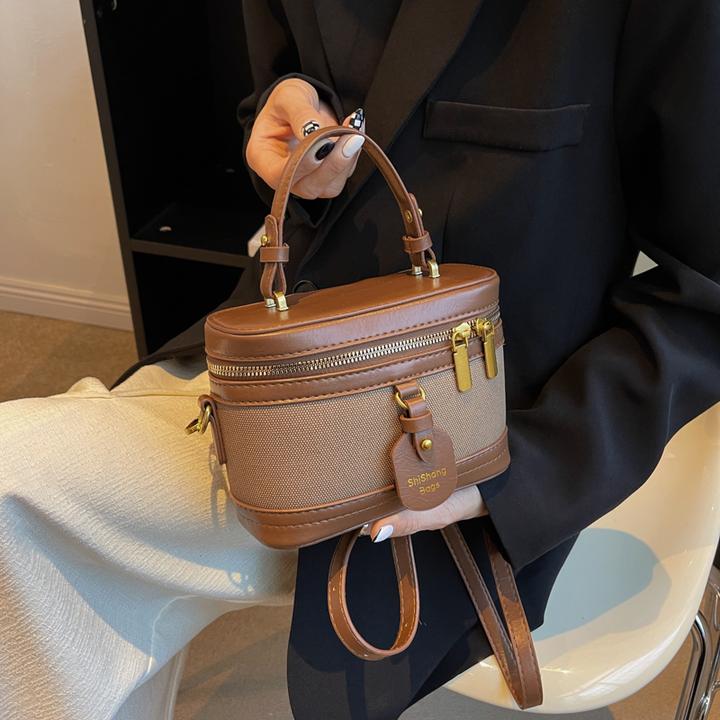 复古时尚手提小包包新款高级感水桶包百搭单肩斜挎包金球软皮女包