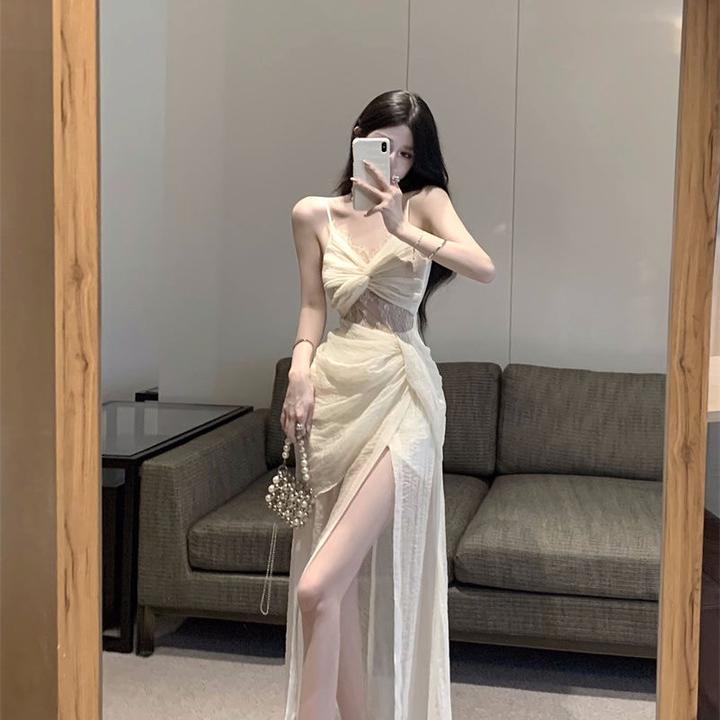 法式杏色扭结吊带连衣裙女夏季蕾丝拼接显瘦长裙开叉收腰a字裙子