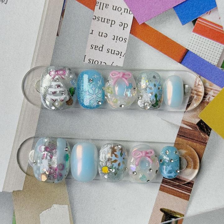 蓝色猫眼亮片蝴蝶结穿戴甲时尚显白手工穿戴甲