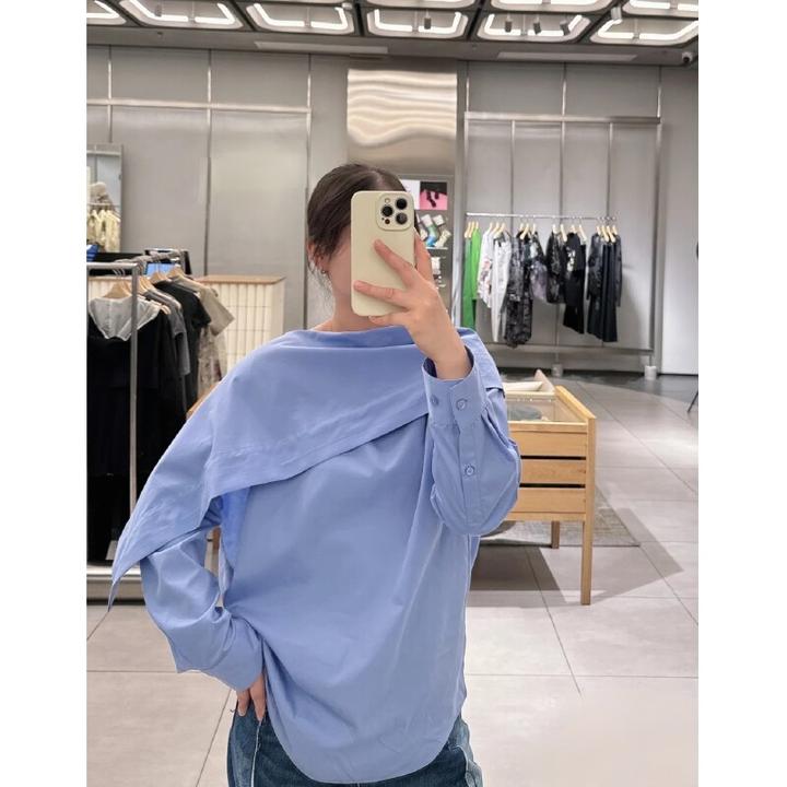 气质高级感时髦蓝色衬衫新款通勤风设计感不规则长袖上衣2025年秋