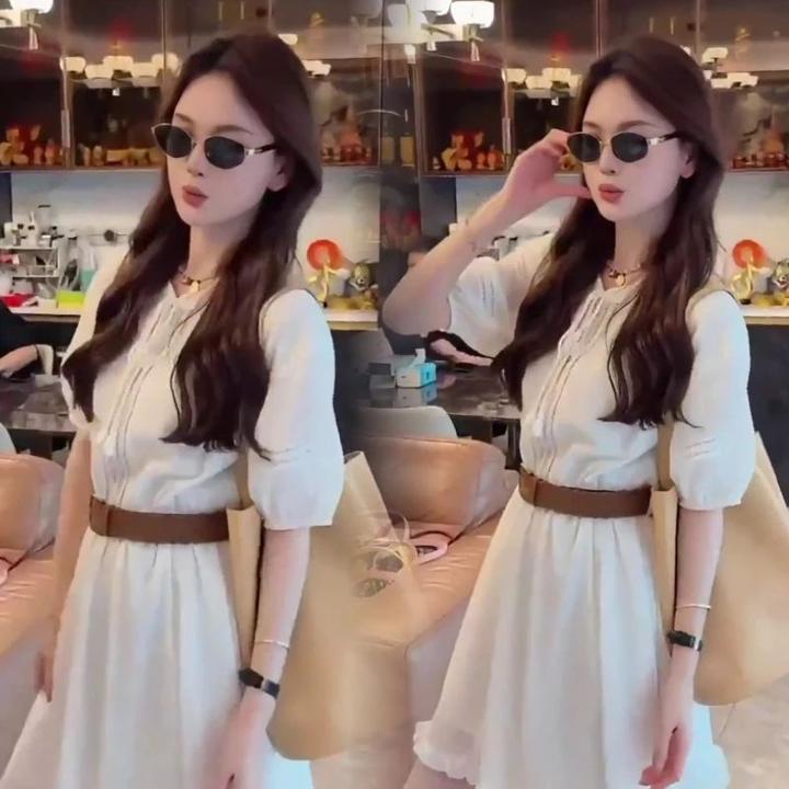 夏季波西米亚风设计感镂空感白色连衣裙女2025新款民族风气质长裙