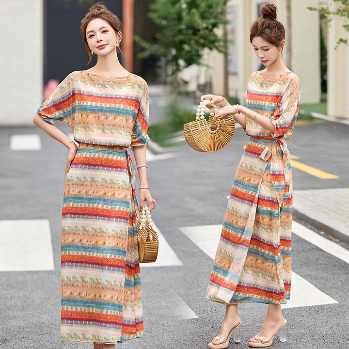 复古波西米亚碎花连衣裙女2025夏季新款度假风系带收腰中长款裙子