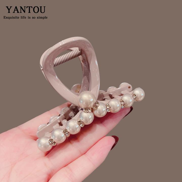 高级感盘发珍珠抓夹女2025新款气质后脑勺网红盘发鲨鱼夹子发饰