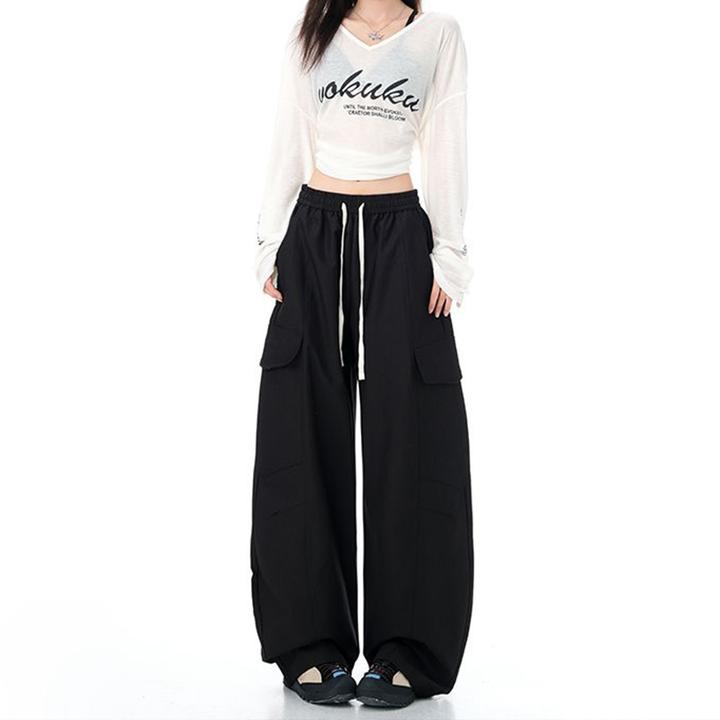 拉夏贝尔黑色休闲运动弯刀裤女宽松慵懒风秋季美式高腰阔腿工装裤