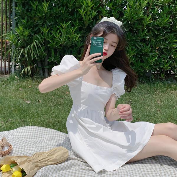 法式气质女款爆款2025新款高级感露背蝴蝶结绑带泡泡袖a字连衣裙