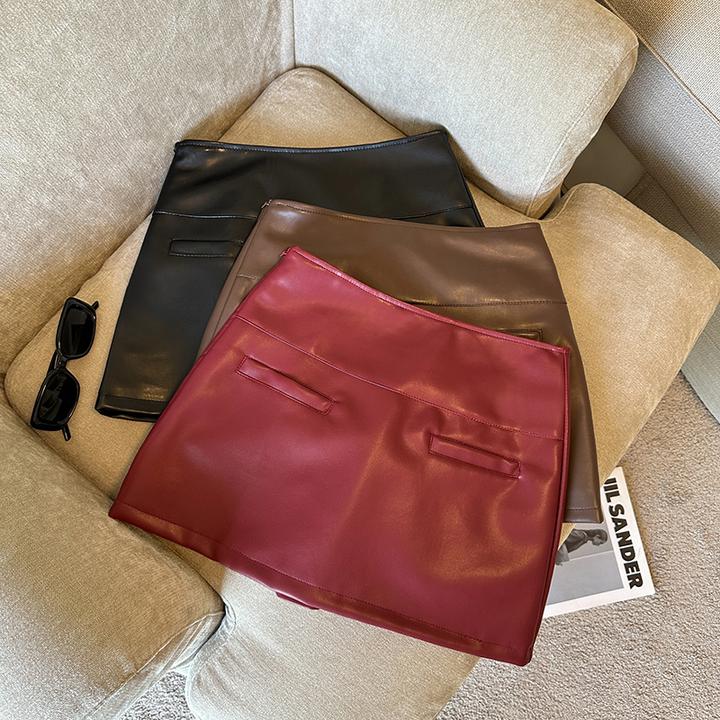 纯欲名媛风百搭pu皮口袋装饰半身裙女洋气简约防走光修身显瘦短裙