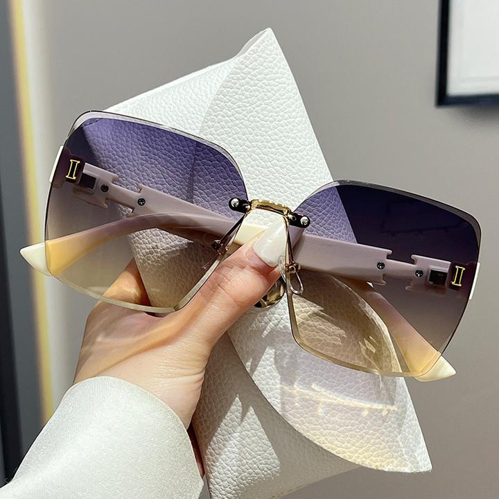 新款时尚无框切边太阳镜大框素颜显瘦墨镜送眼镜盒街拍百搭遮阳女