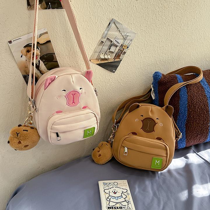 卡皮巴拉水豚斜挎包女生出游单肩背包可爱卡通轻便零食布包洋气包