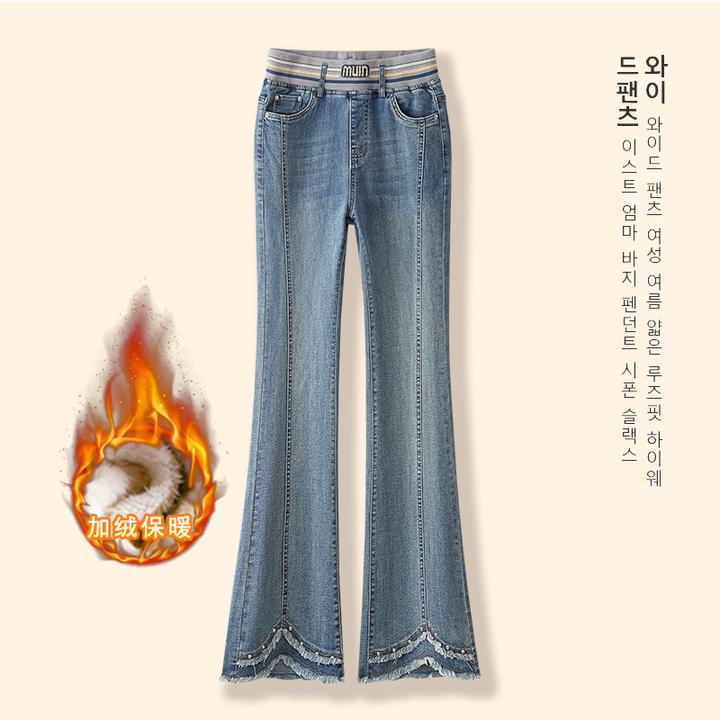 2025新款加绒保暖微喇牛仔裤女士松紧腰毛边显瘦修身长裤冬季时尚