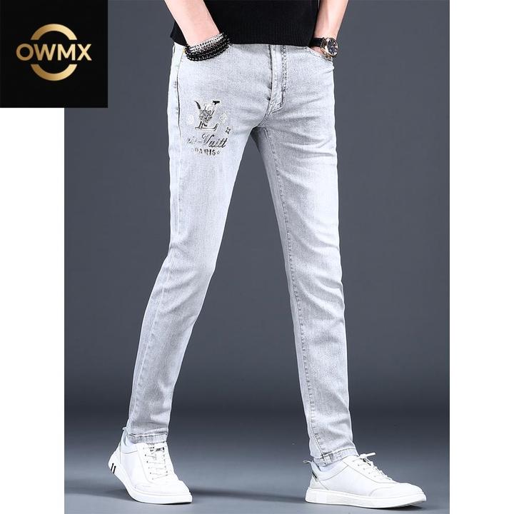 春夏新款高端潮牌牛仔裤男款时尚百搭印花修身小脚浅色男士裤子