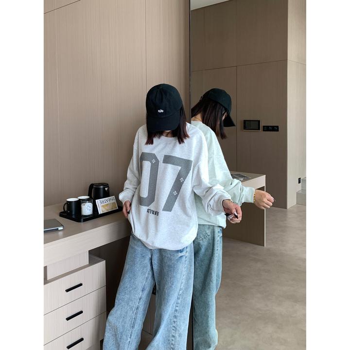 YWBY早春季新款学院风风螺口长袖t恤女宽松百搭休闲纯棉印花上衣