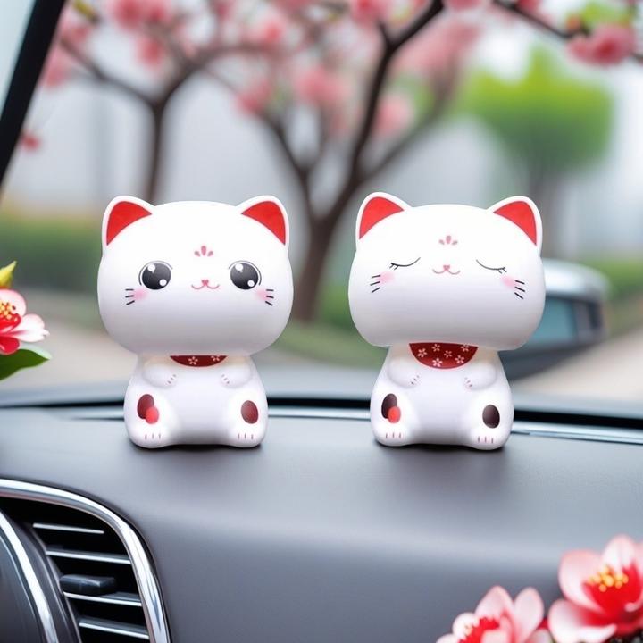 太阳能车载摆件可爱小白猫网红车内装饰品解压创意微光点头招财猫