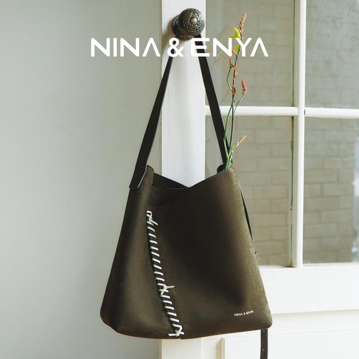 NINA&ENYA妮娜恩雅花绳桶包2025新款通勤轻奢简约真皮单肩斜挎包