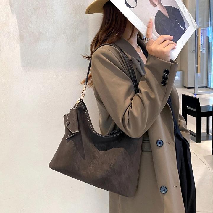 点女士通勤容量6025大未知复古单肩包鱼流浪包百搭卡西尼