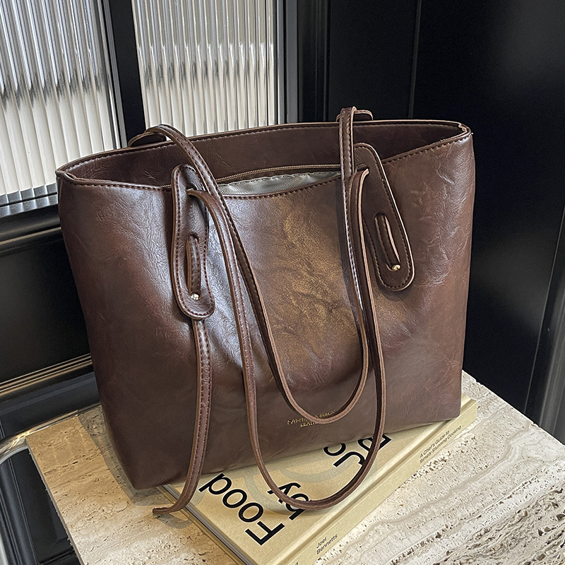 佐猫大容量包包女2025新款托特包高级感小众单肩包时尚百搭通勤包