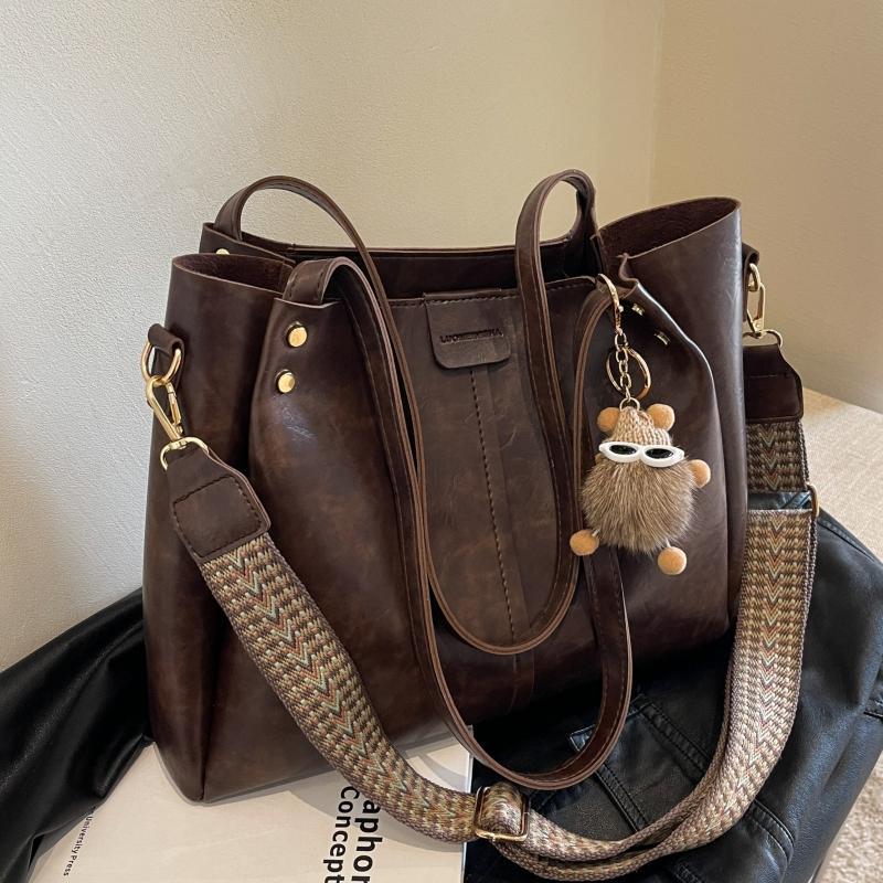 美拉德包包女托特包大容网红斜挎复古2024新款百搭单肩通勤包潮