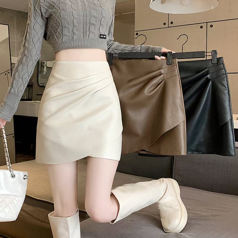 PU皮半身裙女秋冬新款时尚高腰百搭显瘦A字裙不规则设计感甜辣风