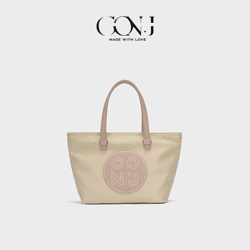 CON.J韩版时尚休闲春夏轻便女士简约通勤便携小众手提单肩包