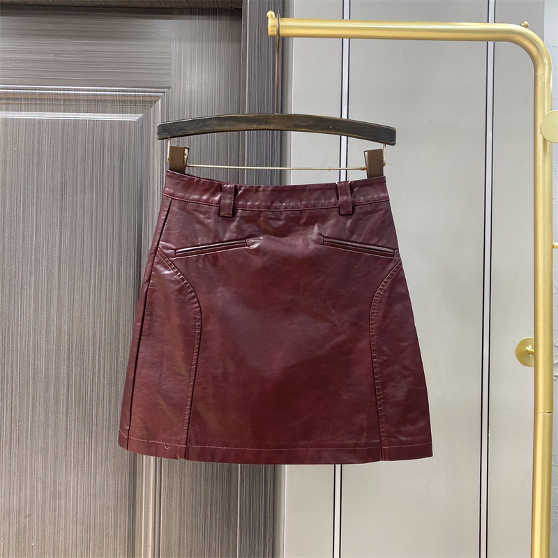 高级感PU皮半身裙女2025春秋新款复古辣妹显瘦百搭A字包臀裙短裙