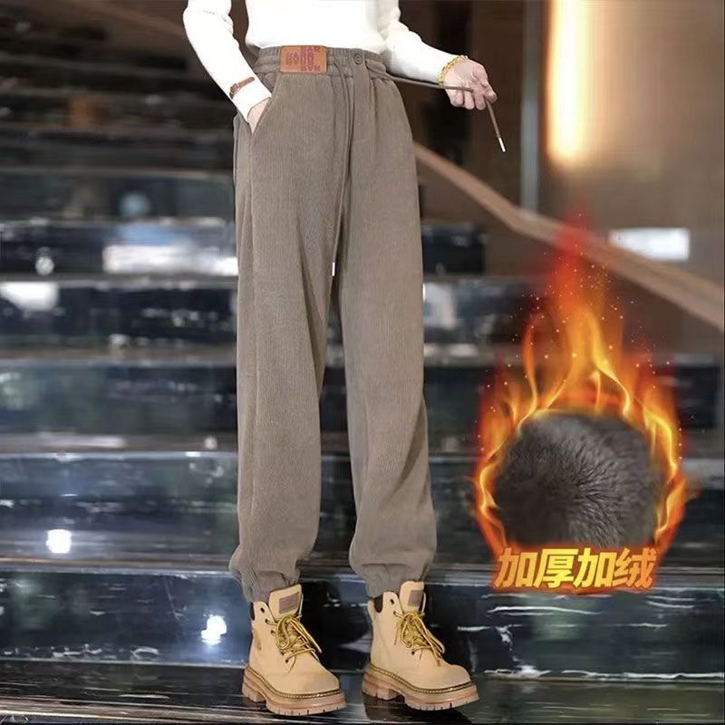 冬季大码300斤加厚加绒灯芯绒裤子女2023新款宽松显瘦束脚哈伦裤