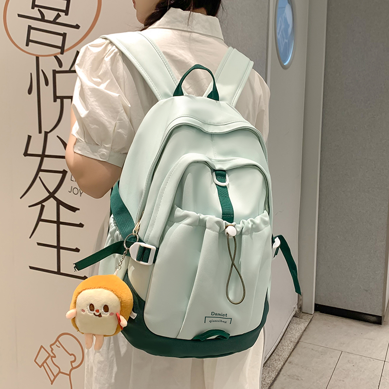 高颜值书包女大学生大容量校园简约双肩包初中生日系休闲旅行背包