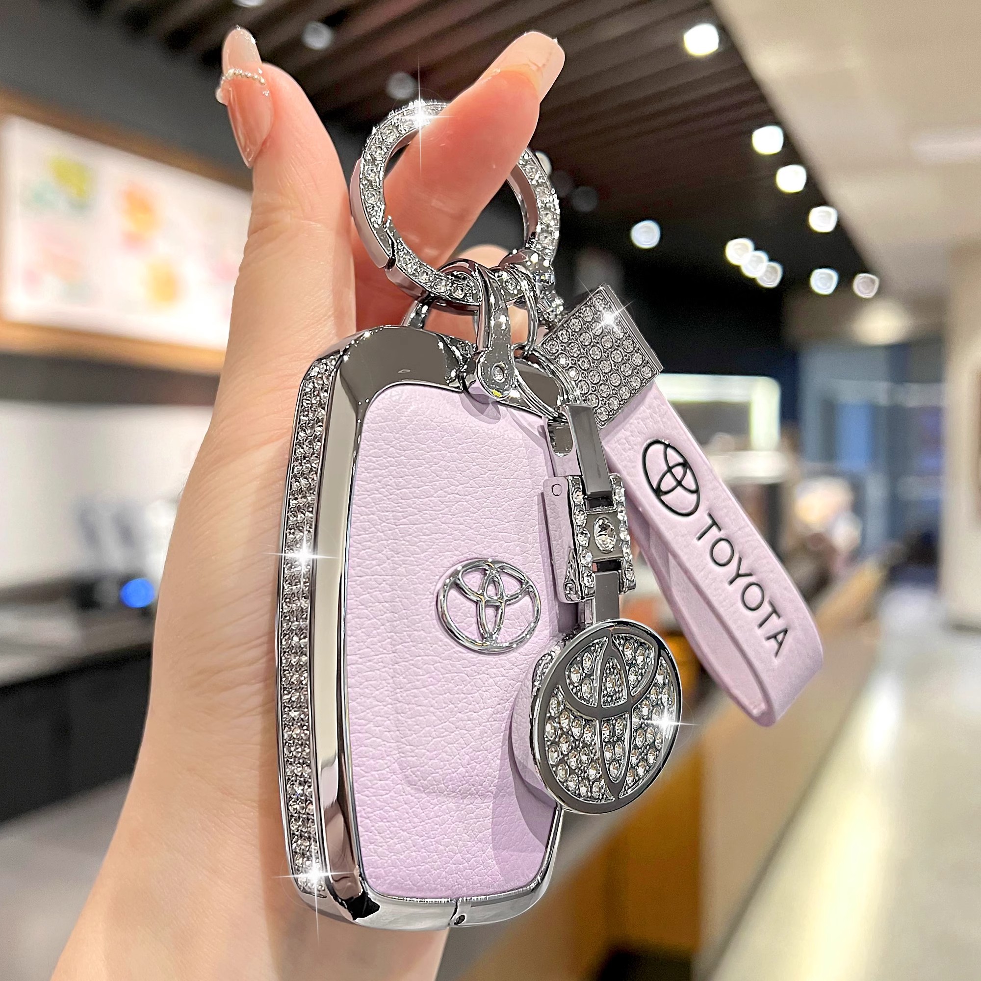 适用丰田雷凌亚洲龙汉兰达凯美瑞荣放rav4卡罗拉汽车钥匙套包扣女