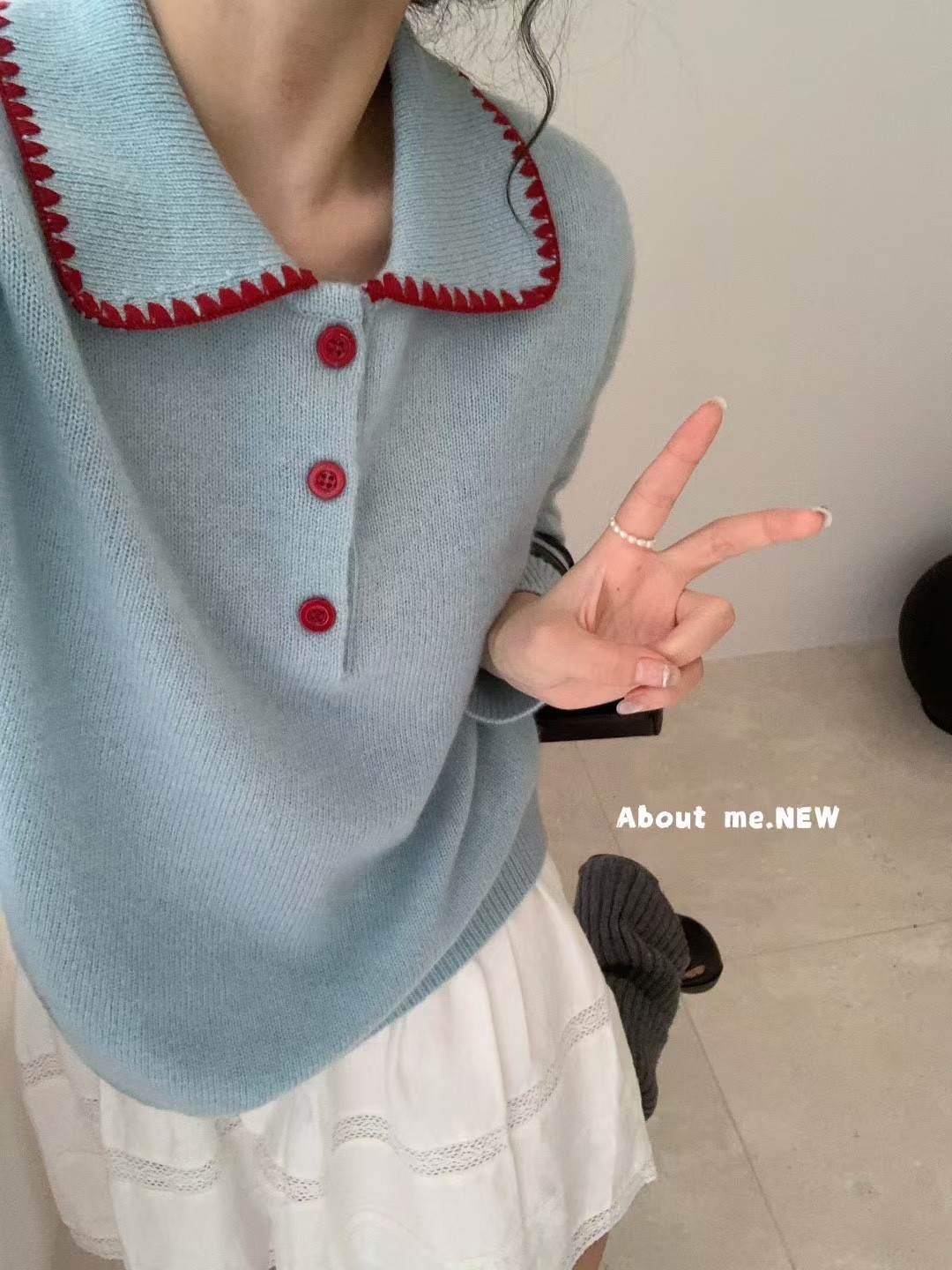 高级感洋气撞色翻领系扣套头针织衫女宽松软糯减龄百搭毛衣秋