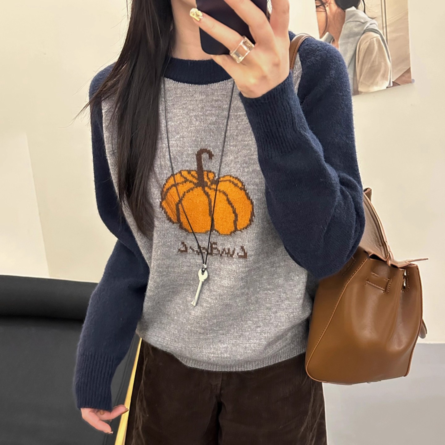 秋冬新款圆领南瓜提花长袖针织衫女韩版撞色拼接宽松套头毛衣上衣