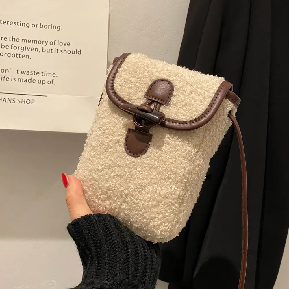 小众设计毛绒包包2025秋冬新款女包流行斜跨便携斜挎包毛毛手机包
