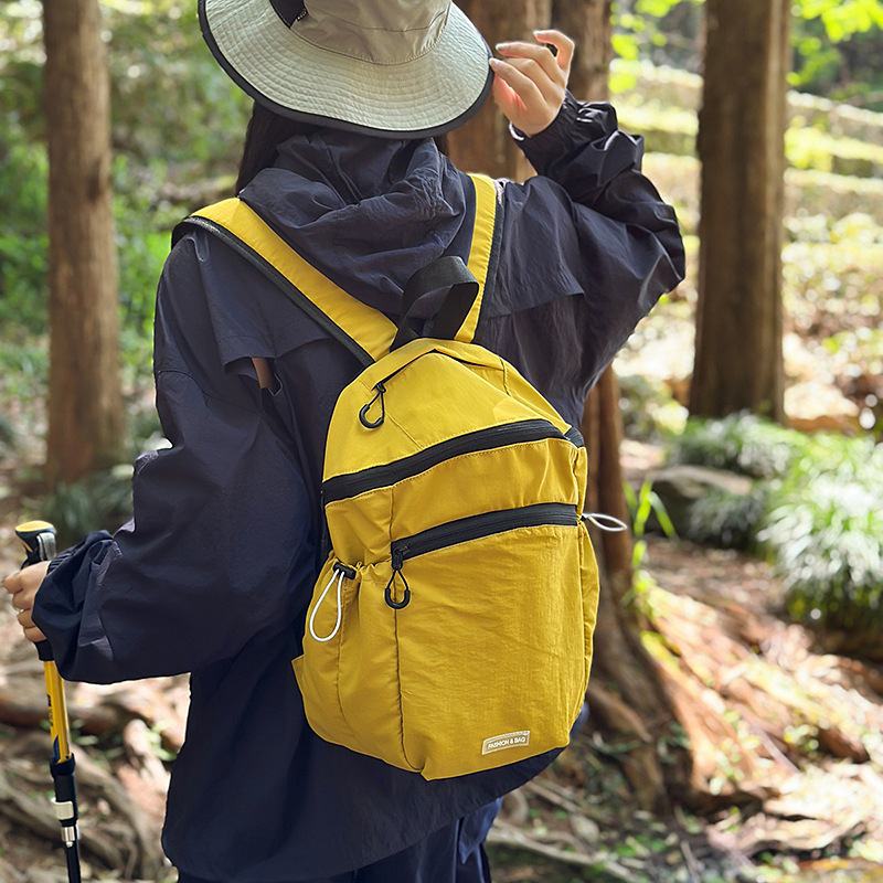 户外登山包轻便徒步旅行包男女运动通勤包纯色轻便防水小双肩背包