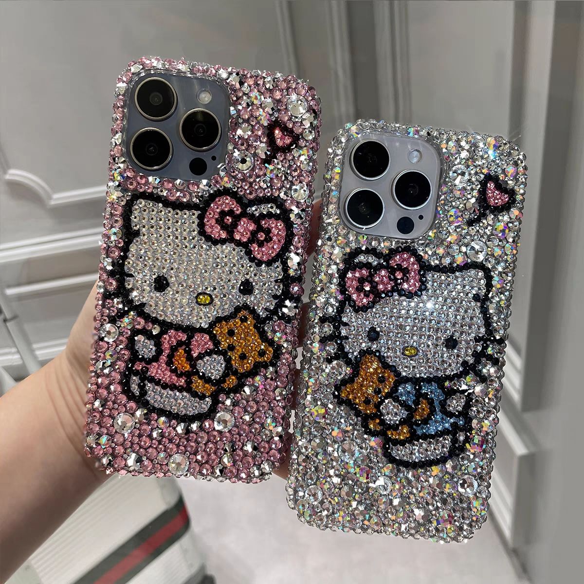 网红懒懒kitty猫高级适用苹果水钻17/16/15/14hellokitty手机壳