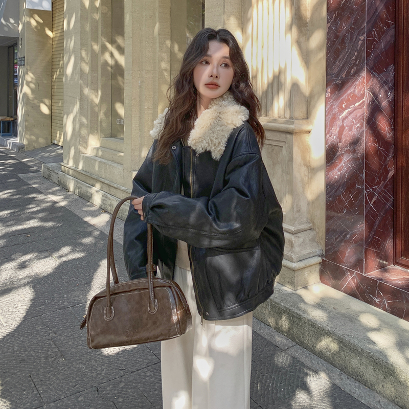 黑色皮衣羽绒服女2025年冬季新款时尚甜酷设计感保暖白鸭绒短外套