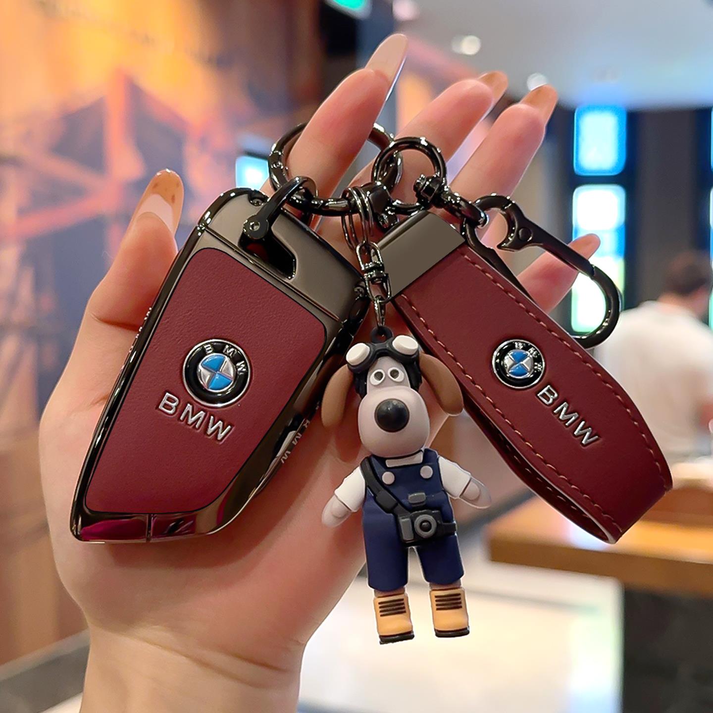 适用宝马钥匙套3系5系x3x5x1刀锋530高档7系i3真皮740壳25款包扣