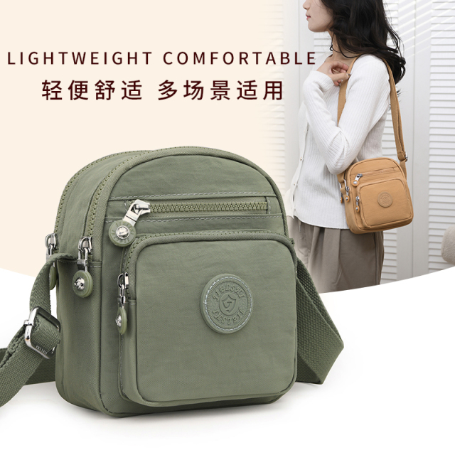 小背包斜挎包女竖款多层包包女休闲轻便牛津布单肩包帆布中年妈妈