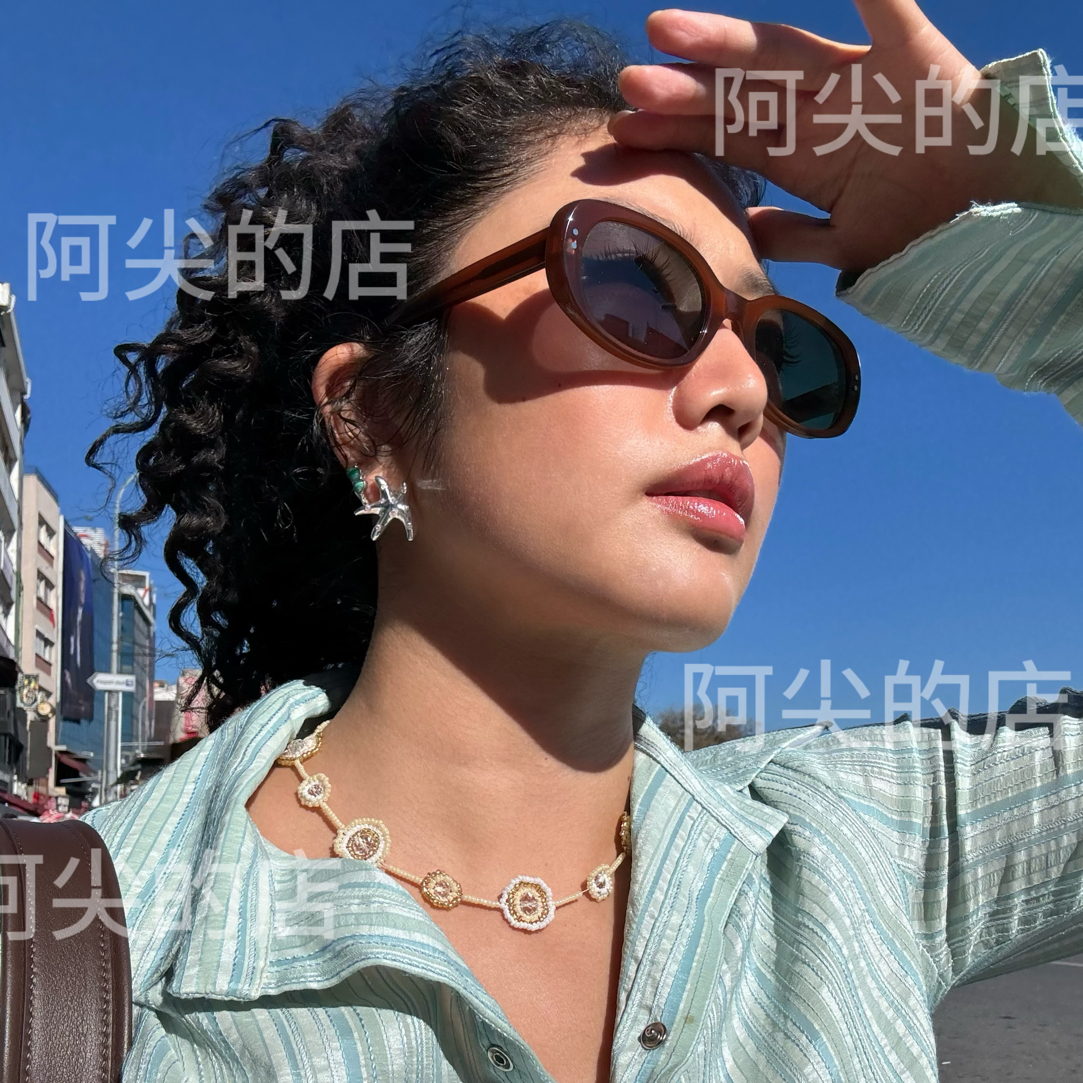 阿尖的店｜橘色墨镜