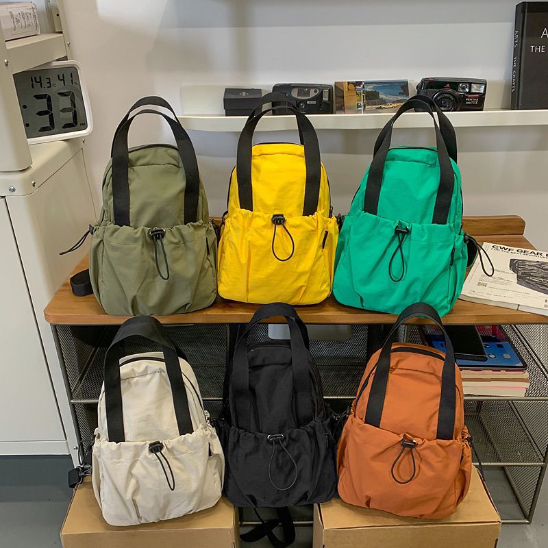 2025新款防泼水尼龙双肩包休闲运动斜挎包