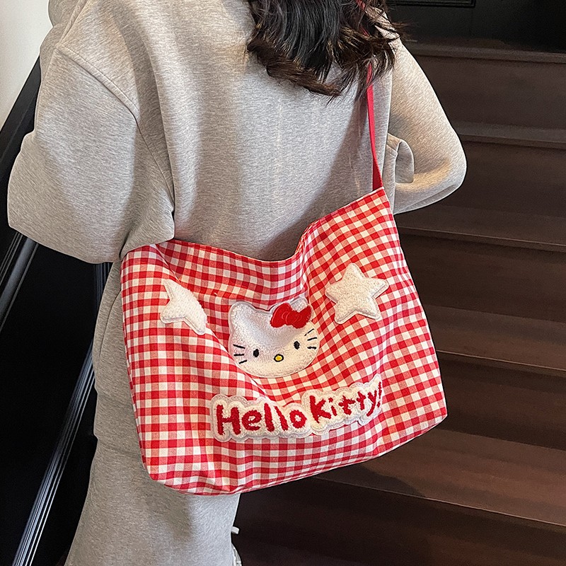 可爱HelloKitty格子单肩包女卡通大容量斜挎帆布包学生上课通勤包