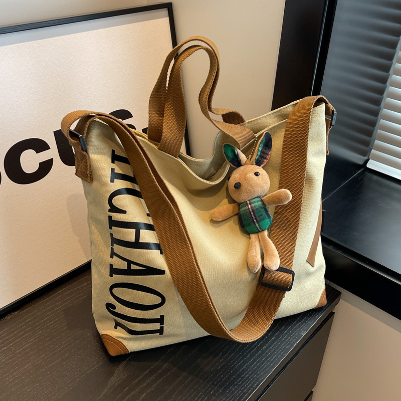 日系帆托包包休闲大容量手提袋通勤学生上课百搭单肩斜挎包