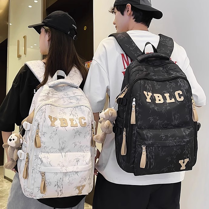 书包女生小学生三到六年级男减负护脊超轻便大容量初中生男双肩包