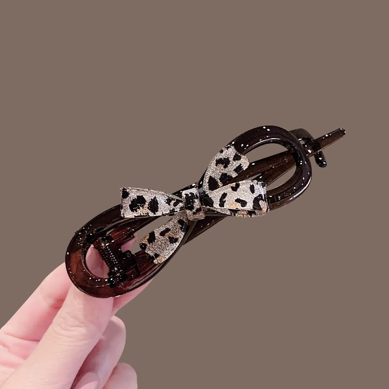 蝴蝶结扭扭夹女后脑勺2025新款高端香蕉夹发饰时尚百搭豹纹侧边夹