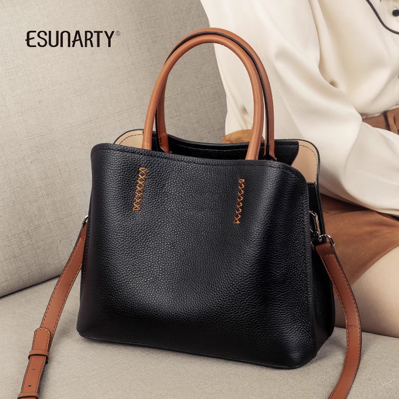 手提包包女款2025新款真皮牛皮气质女包大容量通勤水桶女士斜挎包