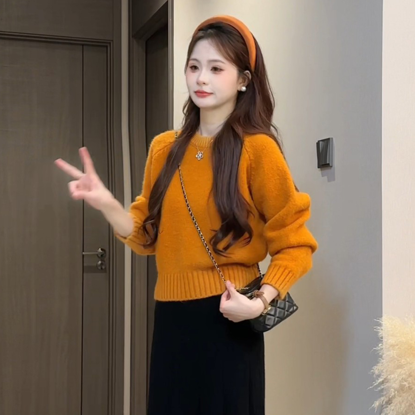 橘色毛衣女2025新款秋冬季绝美巨好看针织衫韩系独特漂亮内搭上衣