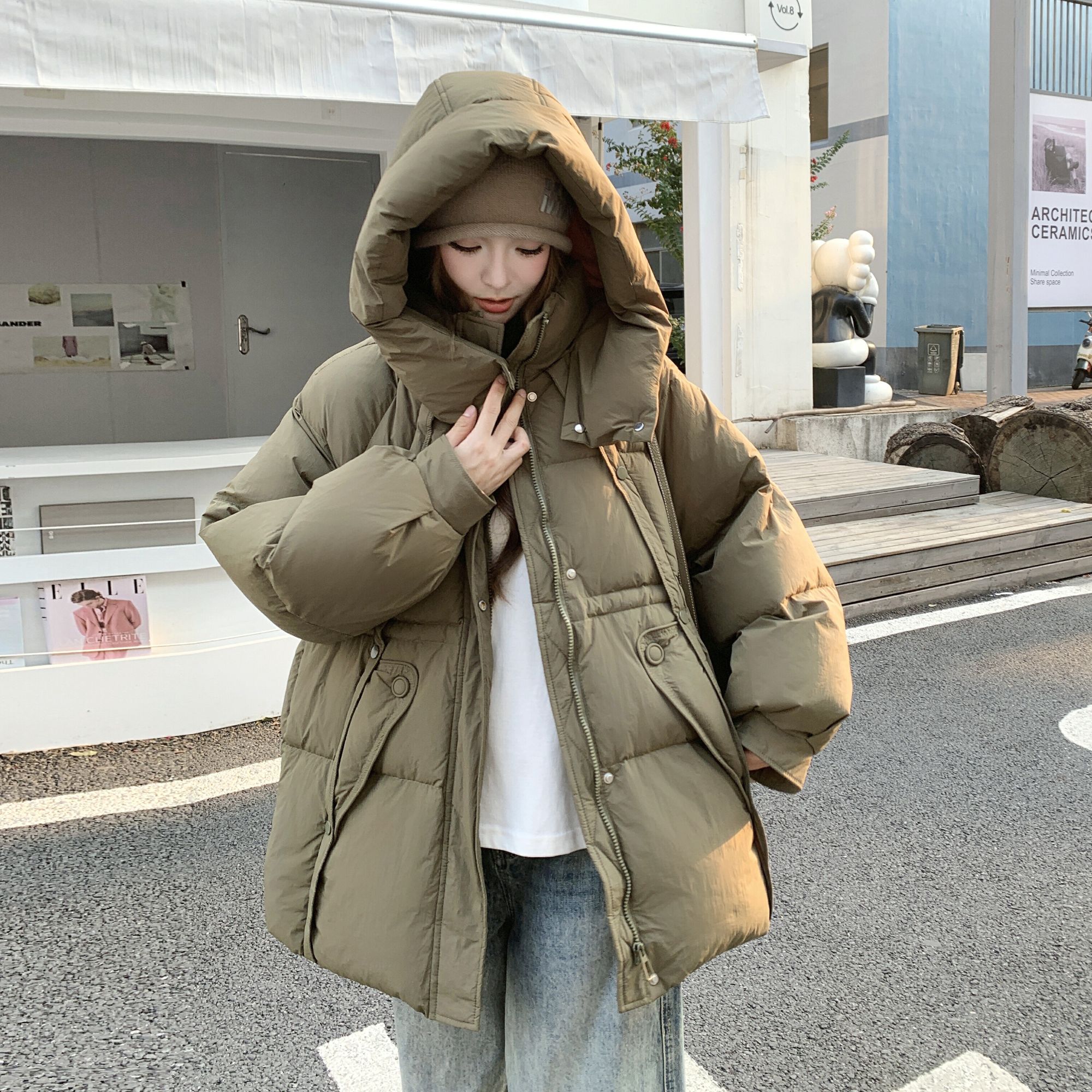 军绿色韩版抽绳显瘦工装羽绒服女2025冬季新款设计感连帽加厚外套