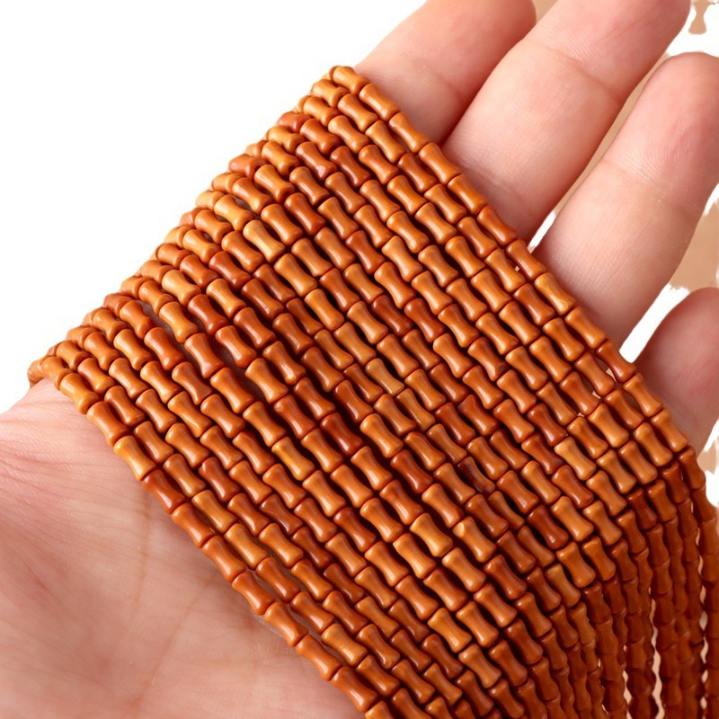 批发橄榄核竹节文玩diy饰品节节高毛衣链百搭尺寸约0.6乘0.3㎜左右