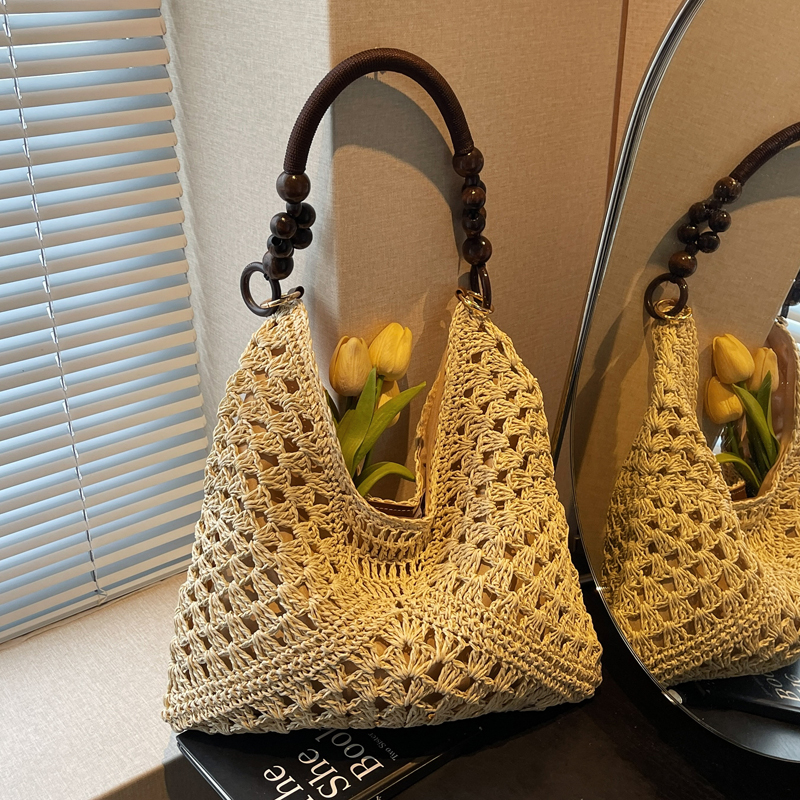 新中式编织包女2025新款海边度假沙滩包串珠单肩草编包百搭托特包
